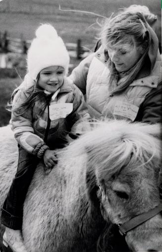 Tara Whalley from Guardian Day School rides a pony, Donnabrook Farm Interpretive Centre. Bolton, Ontario