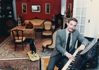 Curator Dan Hoffman in the parlor of the Bowmanville Museu. Bowmanville, Ontario