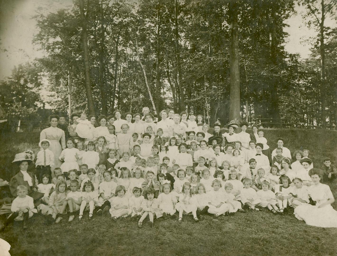 Kew Beach Presbyterian Church Sunday School teachers, mothers and students, possibly at 88 Balsam Avenue, west side, between Queen Street East and Pine Avenue, Toronto, Ontario.