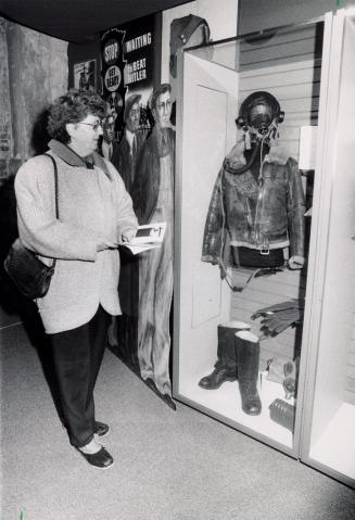 Brampton resident Pearl Gow looking at the displays of the Total War exhibition at the Region of Peel Museum. Brampton, Ontario