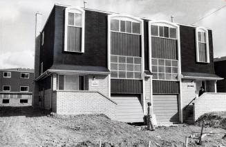 Modified Tudor style home built by Academy Homes. Brampton, Ontario