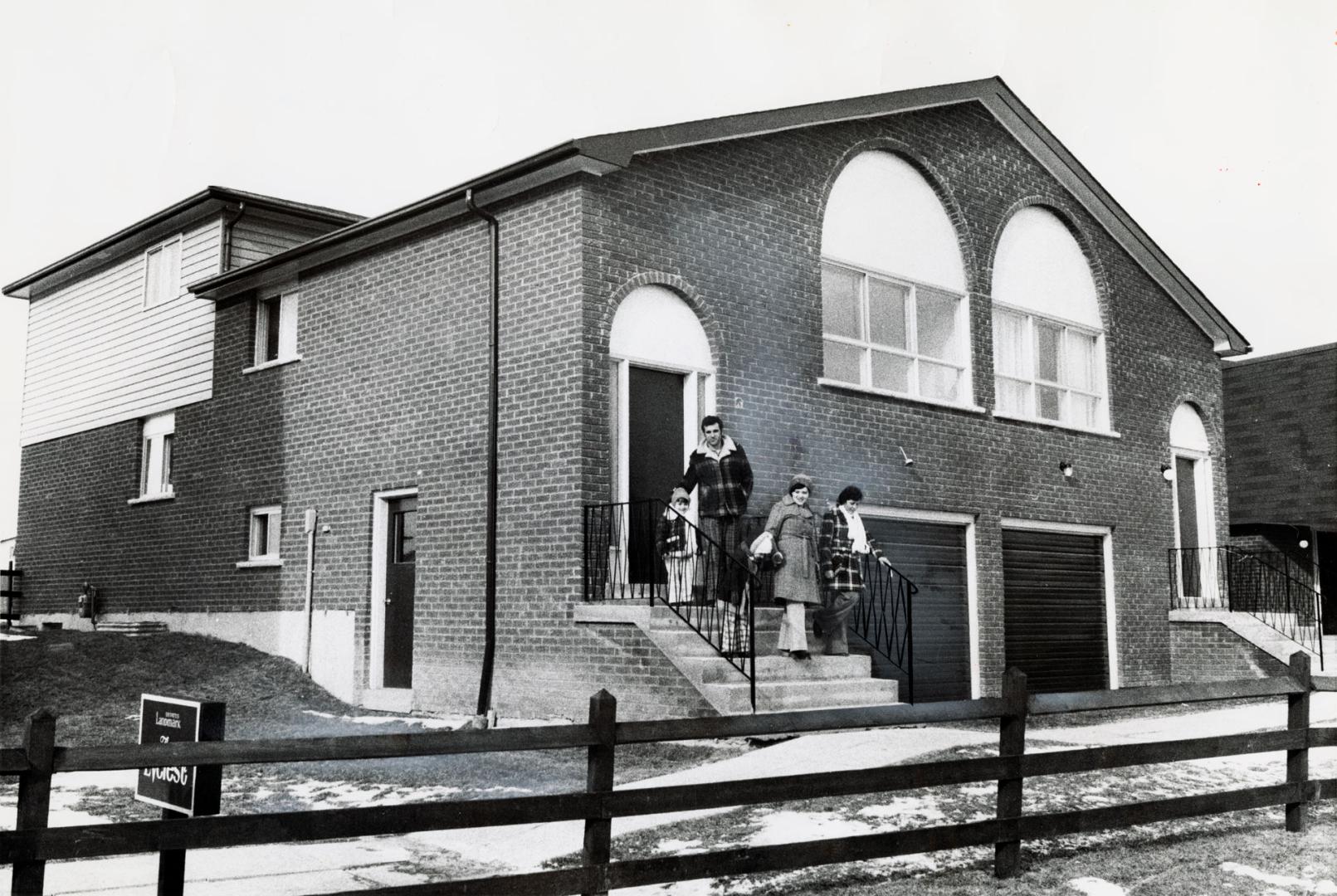 Semi-detached model house with Spanish motifs in Landmark Estates. Brampton, Ontario