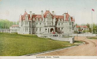 Image shows a three storey house with some lawn space on the left.