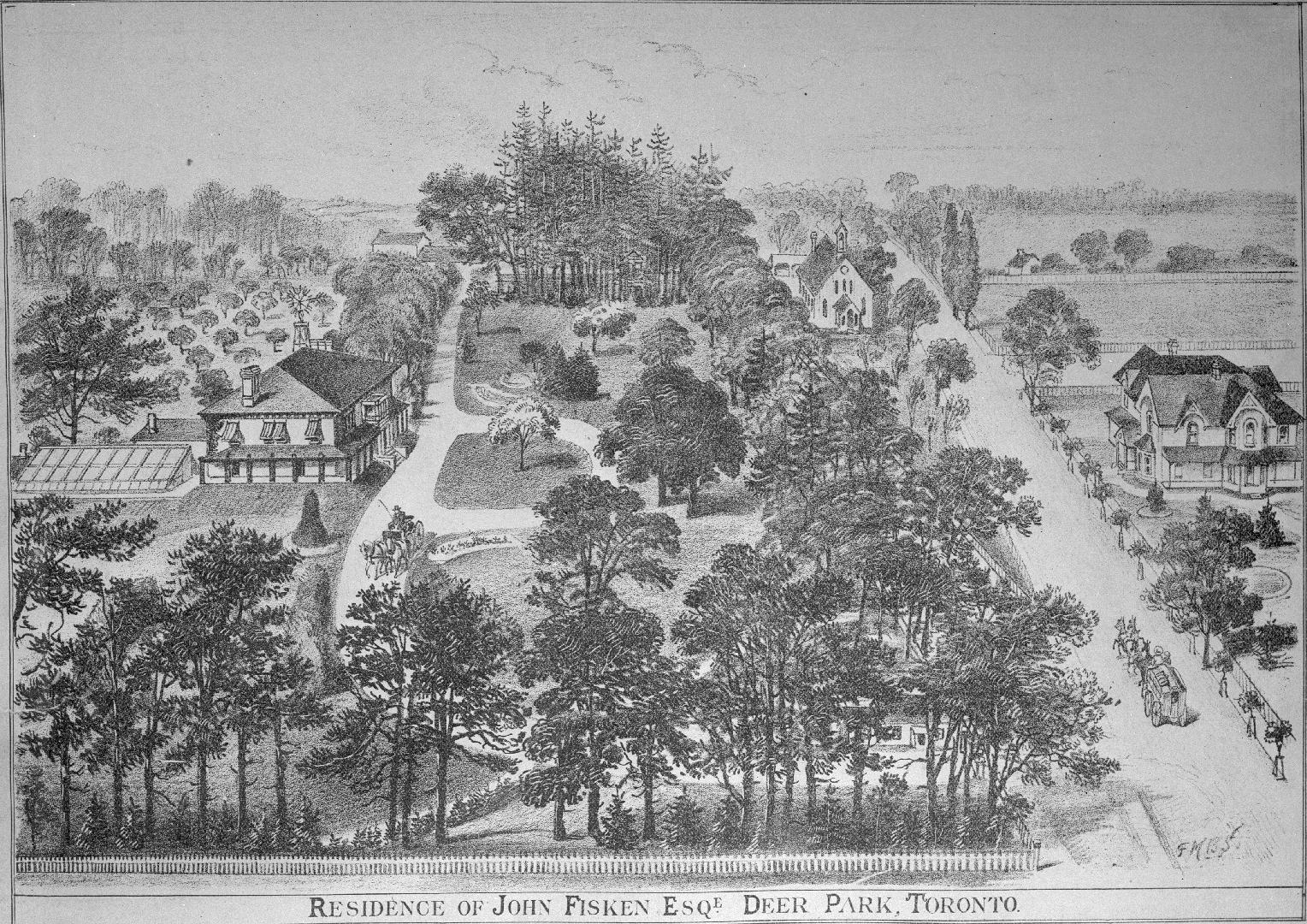 Image shows a view of a few streets, some houses and many trees.