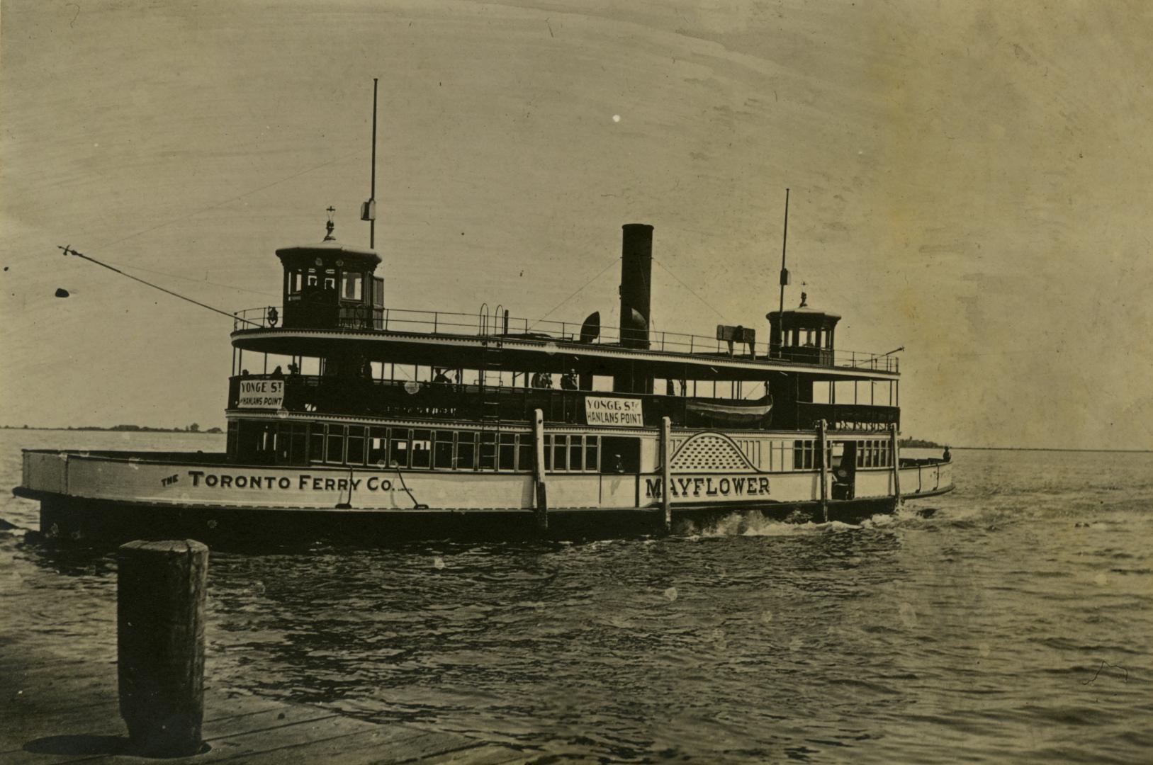 Image shows a ferry on the lake.