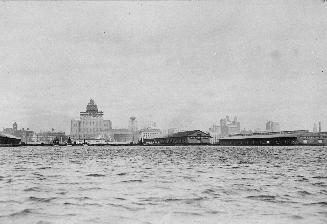 Image shows a lake view with the Toronto Harbour in the background.