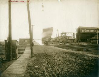 Image shows some buildings along the lake.