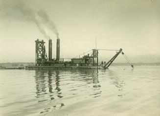 Image shows dredging in progress.