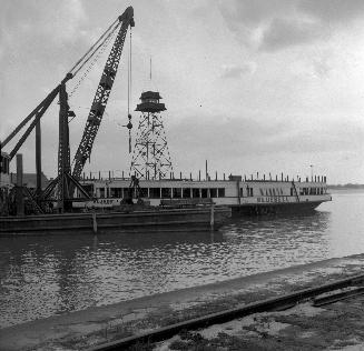 Image shows a Bluebell ferry by the docks.