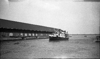 Image shows a ferry on the lake.