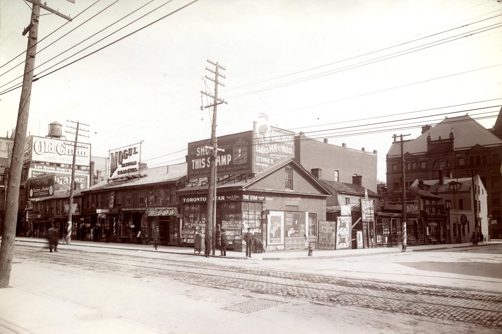 Queen Street West, Yonge to Simcoe Streets, southeast corner Bay St