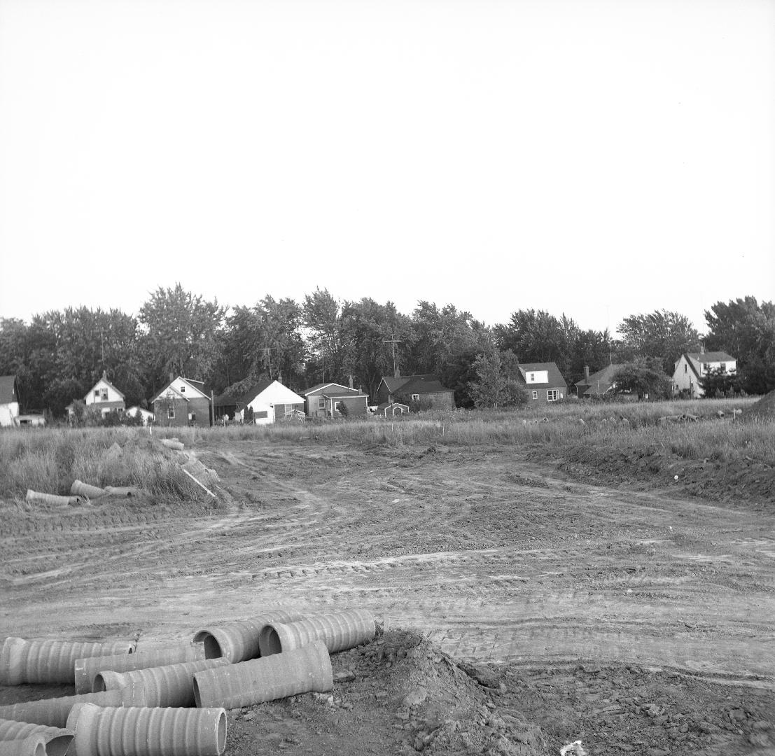 Santa Barbara Road., looking southwest from Kempford Boulevard, showing rear of houses on Hounslow Avenue in background