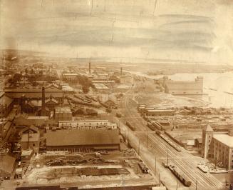 Image shows an aerial view of the waterfront buildings.