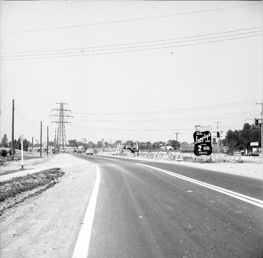 Bloor St. West, looking west from west of Islington Avenue, showing construction of subway under C.P.R. tracks