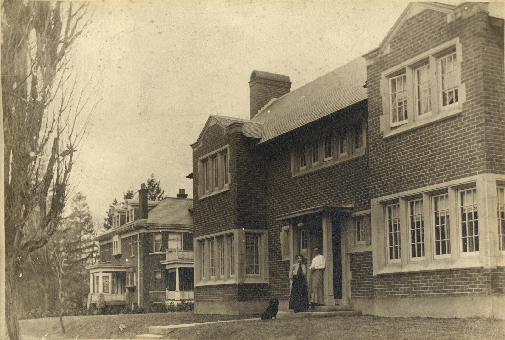 Image shows the front side of a two storey residential house.