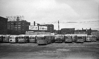 T.T.C., garage, Sherbourne Garage, Sherbourne St., northwest corner Esplanade E., looking north to Front Street East