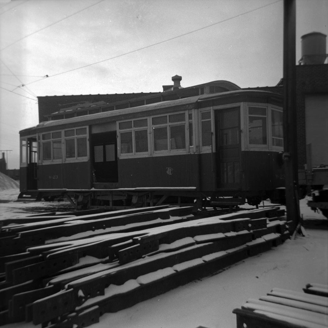 Image shows a work car on the tracks.