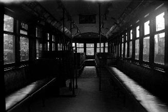 Image shows an interior of a TTC rail car. 