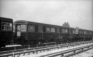 Subway Car #5013, arriving at Davisville yards. Image shows a subway train on the tracks.