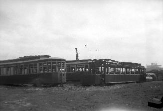 T.T.C., cars, on Mill St., showing l. & r. #s 1826 & 2016