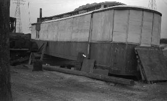 T.T.C., #2010, in use as storage for coal bags, etc., in coal yard on Unwin Avenue