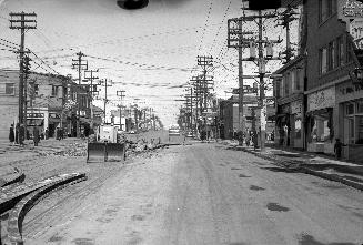 Yonge St. looking north from south of Eglinton Ave., showing removal of streetcar tracks. Image…