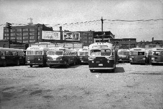 T.T.C., garage, Sherbourne Garage, Sherbourne St., northwest corner Esplanade E., looking north to Front Street East