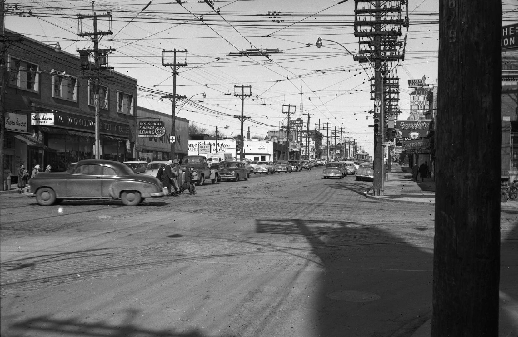 Yonge Street looking north from Eglinton Avenue, Toronto, Ontario. Image shows a street view wi…