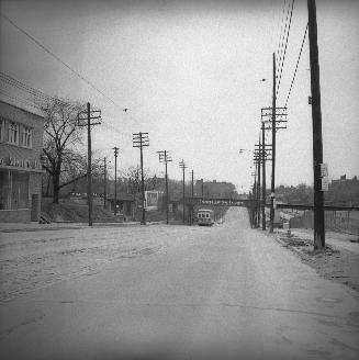 Yonge Street looking south from north of Merton Street, Toronto, Ontario. Image shows a street …