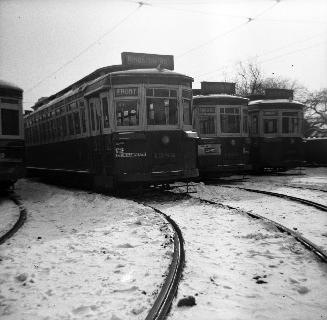 T.T.C., #1382, at Russell carhouse, showing also, 1. to r., 1450 & 1438