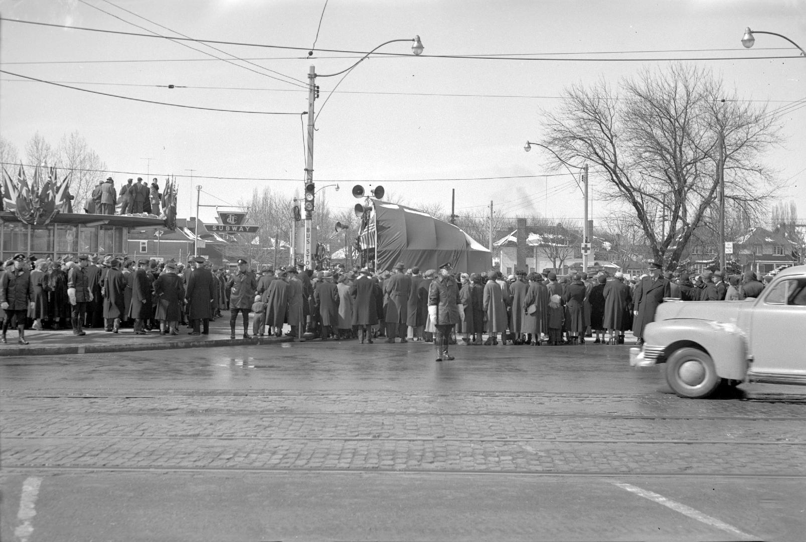 T.T.C., Yonge St. subway; opening ceremonies outside Davisville station, looking west from Yong…