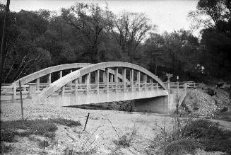 Image shows a bridge view across the river.