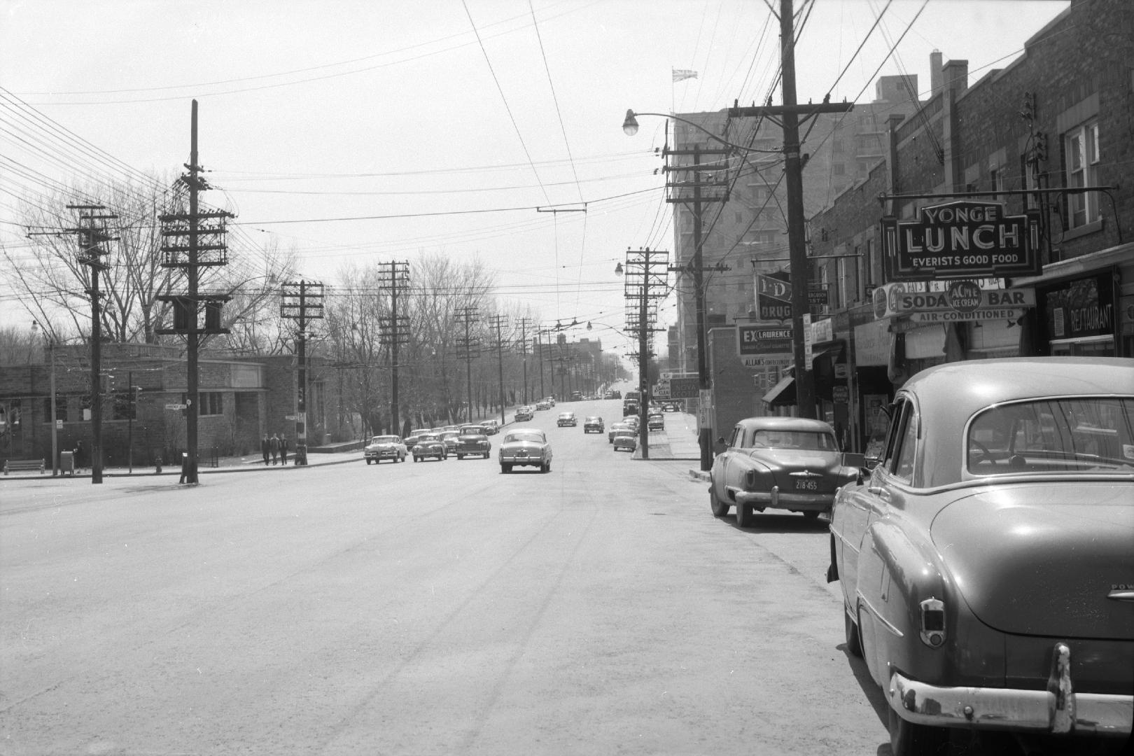 Yonge Street, looking south from north of Lawrence Avenue, Toronto, Ontario. Image shows a stre…