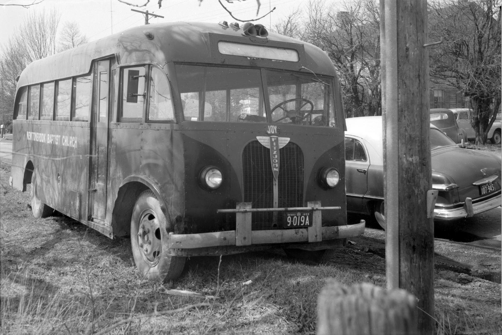 Hollinger Bus Lines, Bus #15, in use by Newtonbrook Baptist Church, parked at Steeles Avenue W