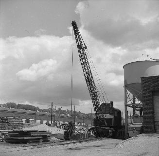 Image shows a crane on the tracks.