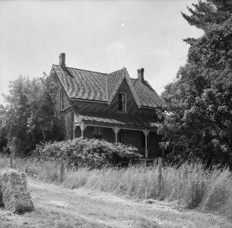 Image shows a limited view of a two storey residential house.