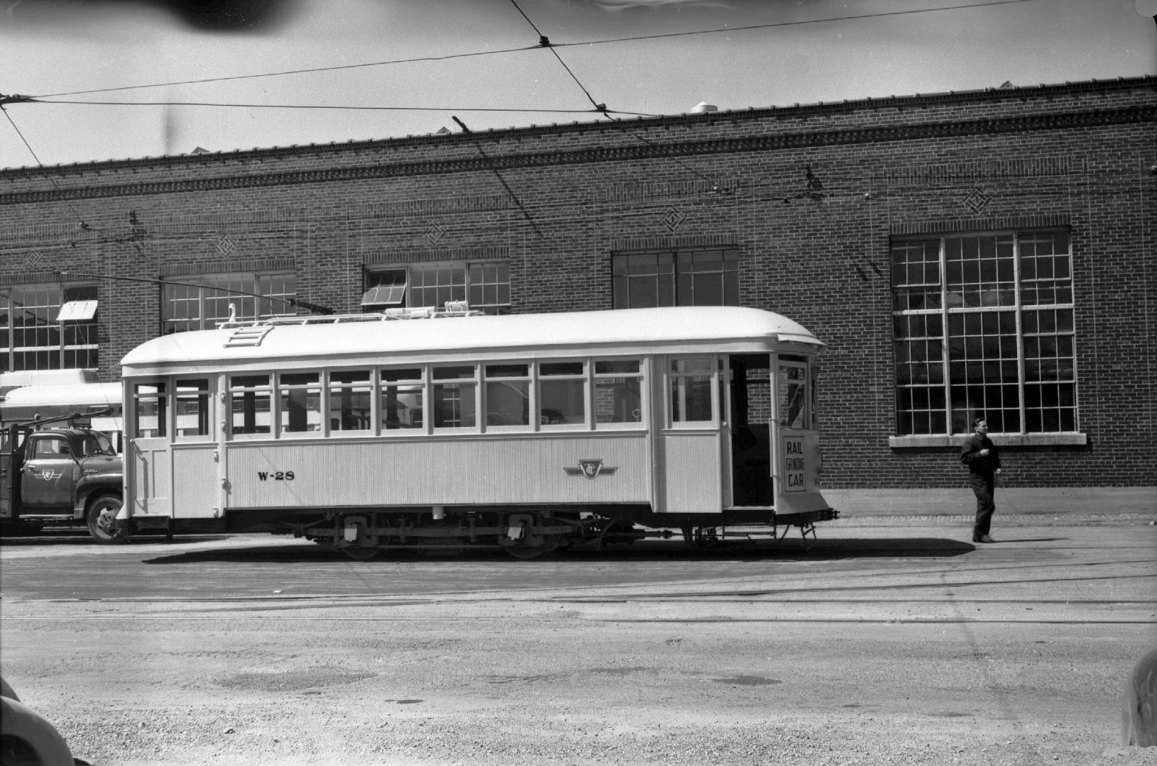 Image shows a work car on the tracks.