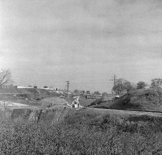 Image shows a view of the street under construction.