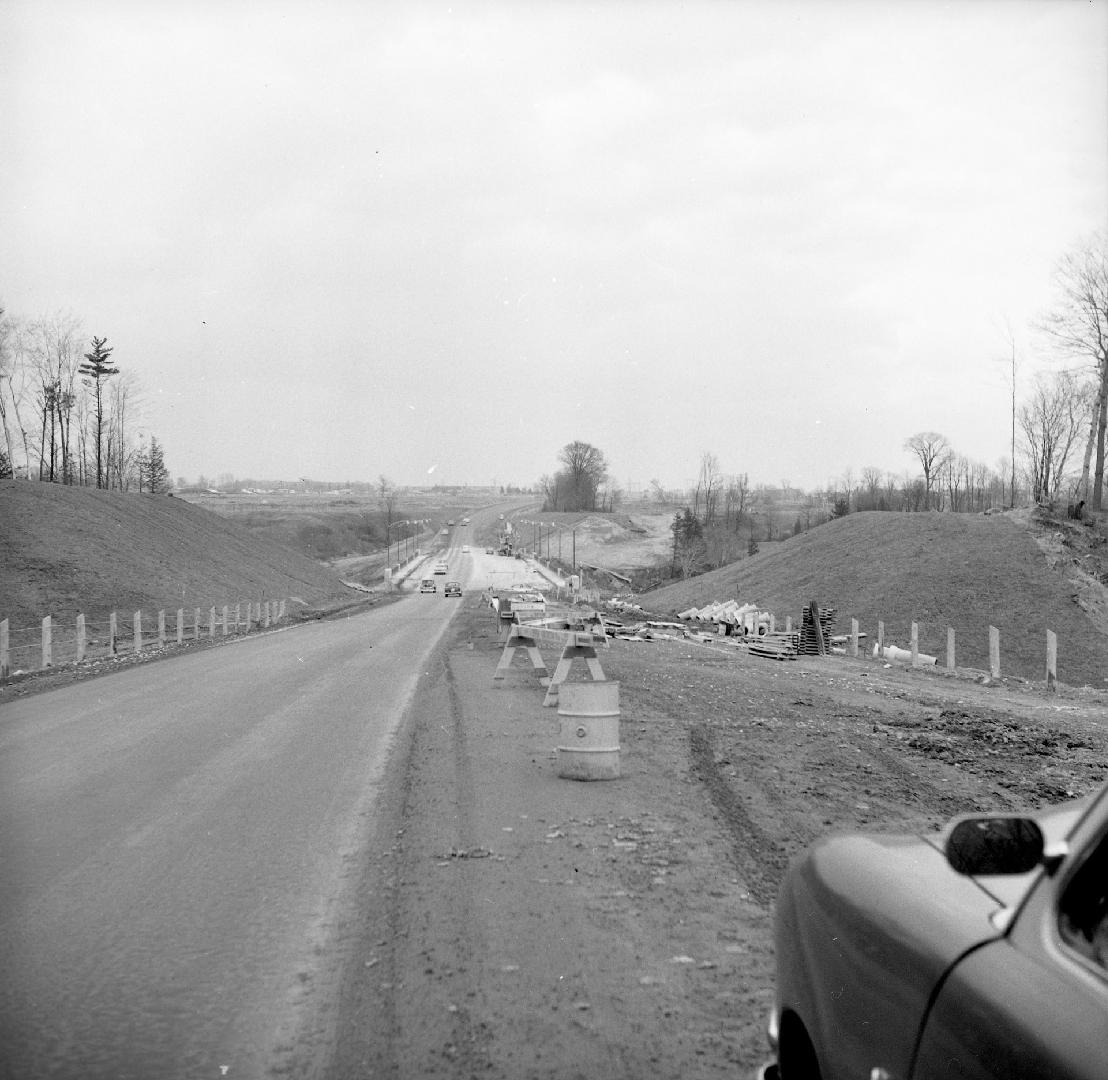 Eglinton Avenue E., looking east across bridge over Don River, during construction. Toronto, Ontario