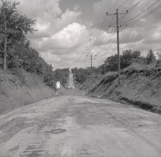 Bathurst St., looking north across West Don River during construction of causeway