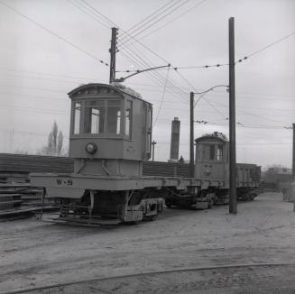 Image shows a TTC construction car.