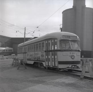 Image shows a rail car on tracks.