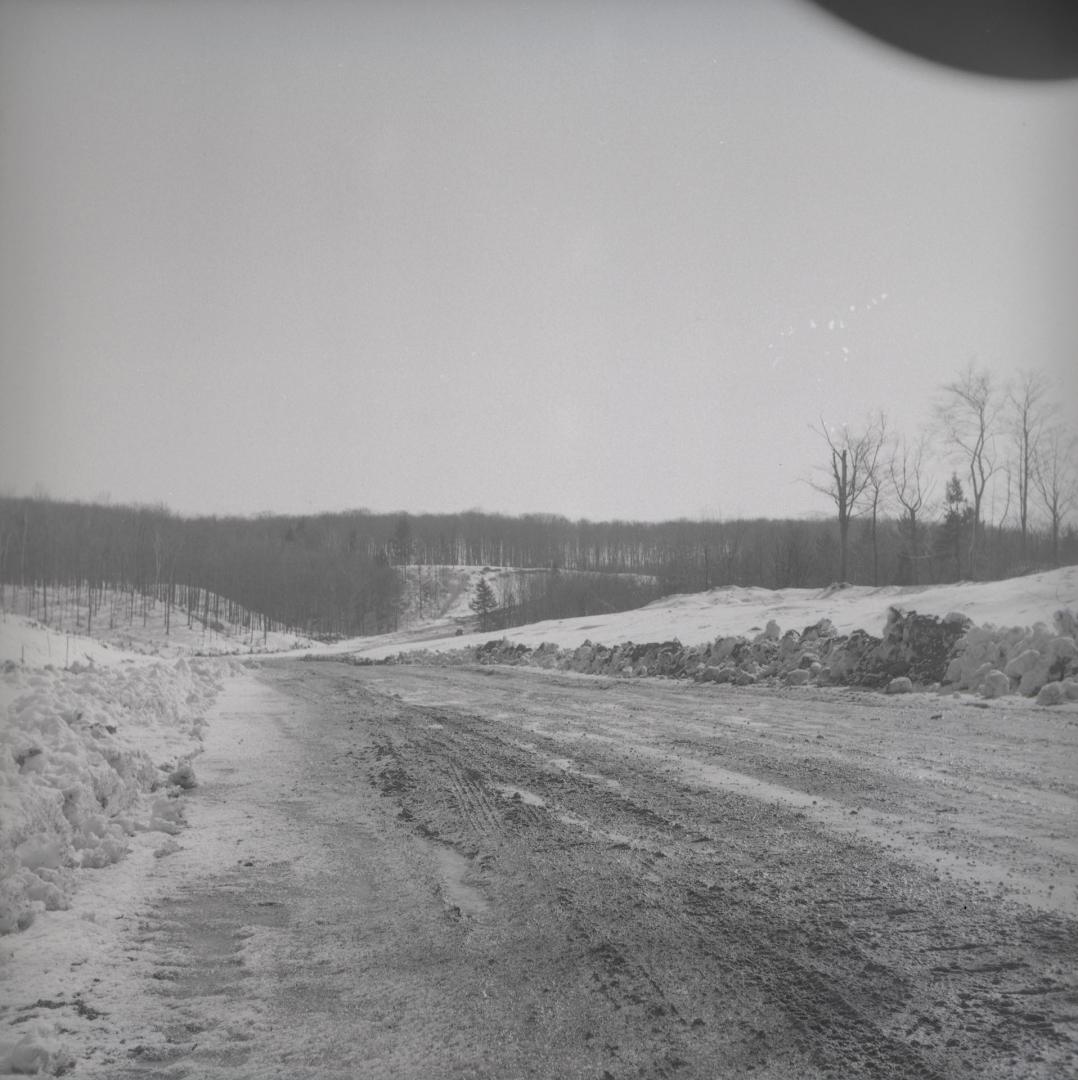 Image shows a street view in winter.