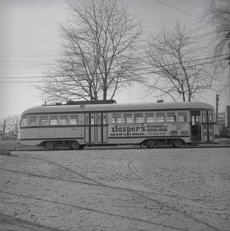 Image shows a rail car on the tracks.