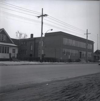 Queensway Public School, The Queensway, south side, between Taymall & Plastics Aves