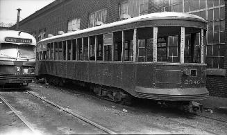 Image shows a few rail cars on the tracks. 