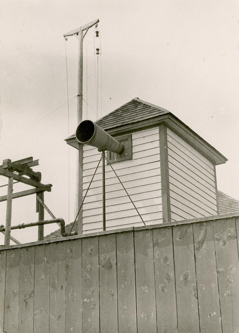 Image shows the top part of the station above the fence.