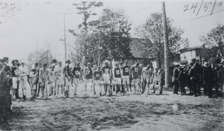 Image shows a running race participants ready to start in North Toronto, Ontario. There are obs…