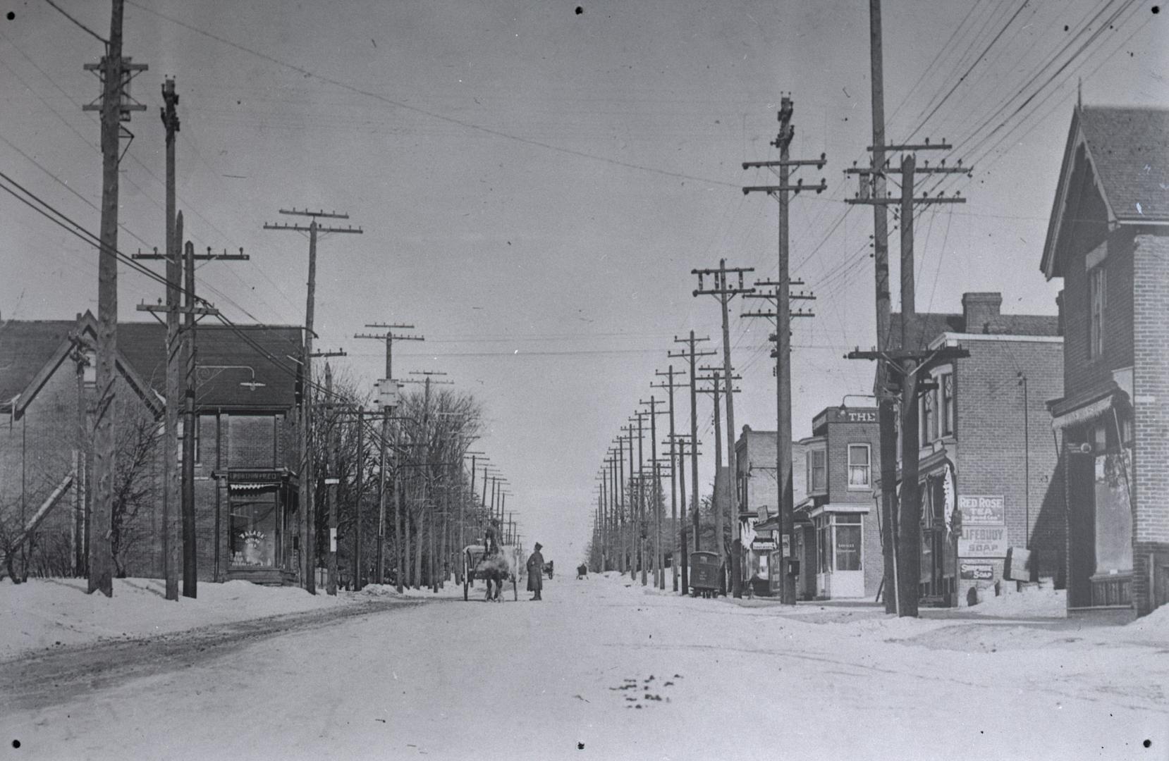 Yonge Street looking north from south of Eglinton Avenue, Toronto, Ontario. Image shows a winte…