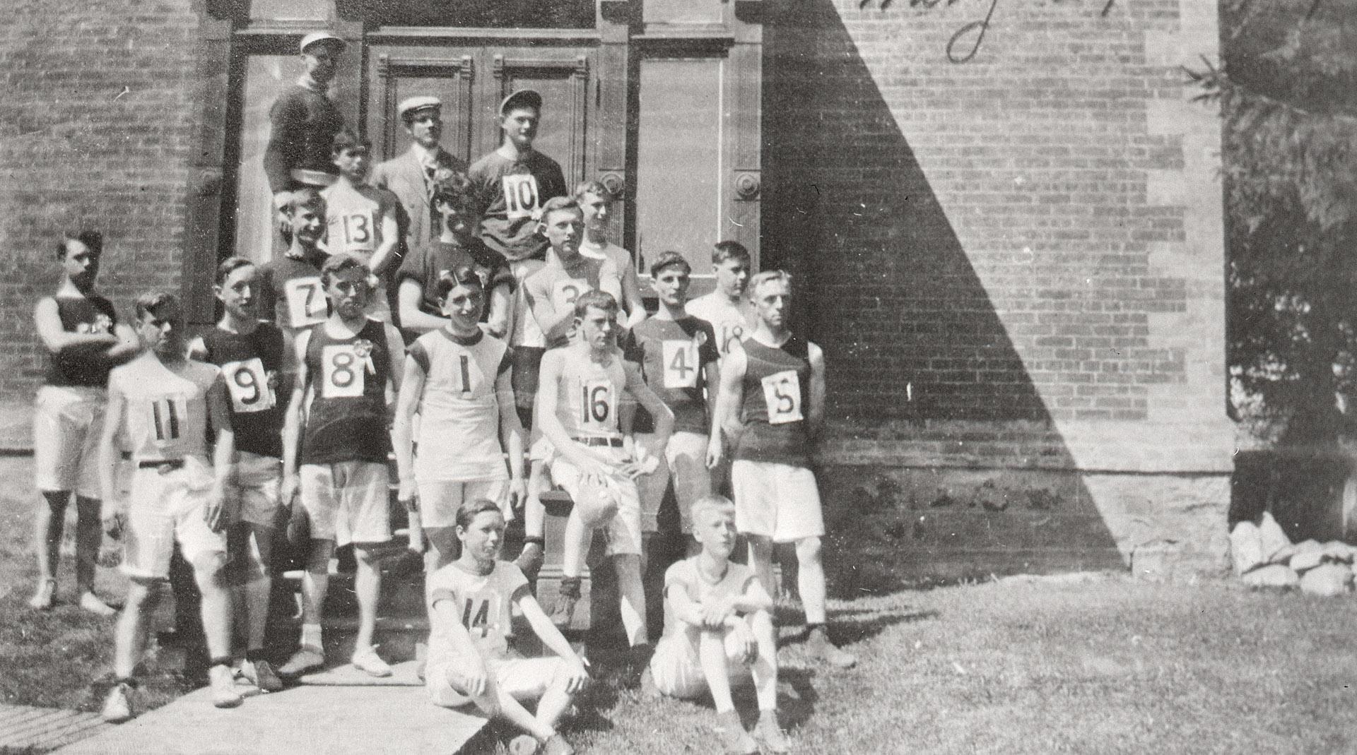 Race, North Toronto, Ontario. Image shows a group of race participants posing for a photo in fr…